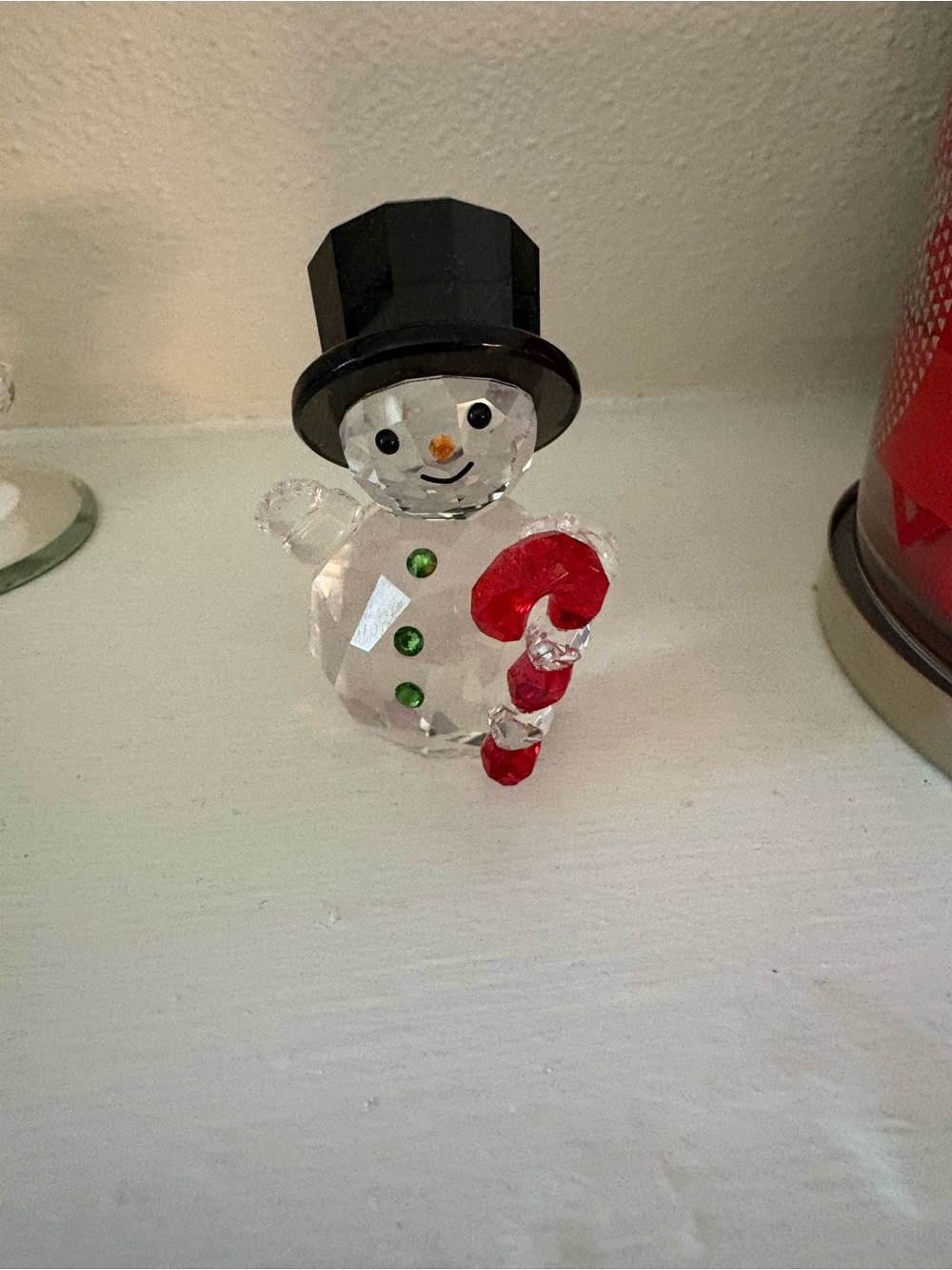 Swarovski Crystal Snowman Figurine with Red Candy Cane and Black Top Hat